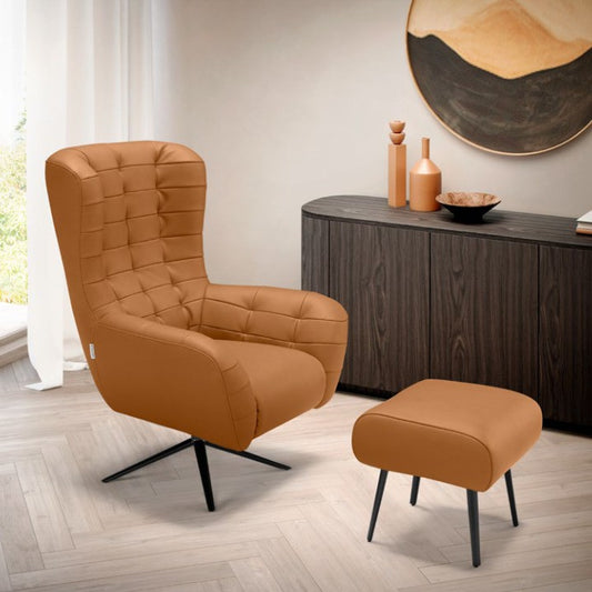 Patrick armchair with a matching ottoman in cognac upholstery in a bright living room with herringbone wood floor