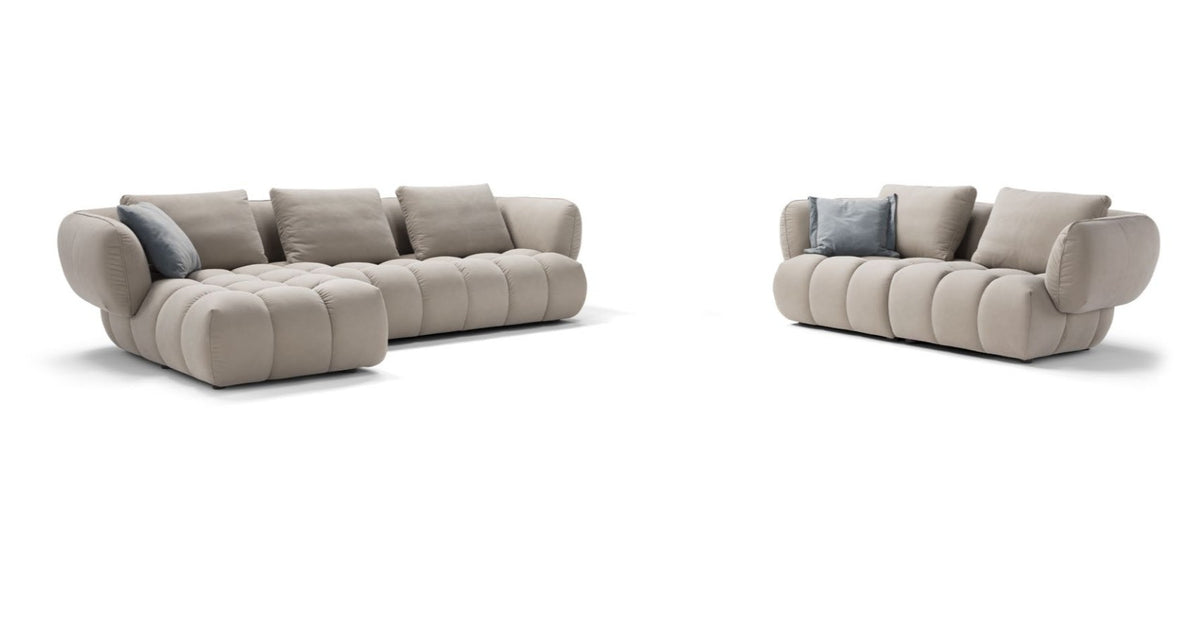Abbracci sectional sofa and 3-seater sofa shown together in beige fabric on a white background