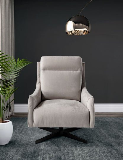 Front view of the Alicudi swivel armchair in light grey fabric with a black four-star base
