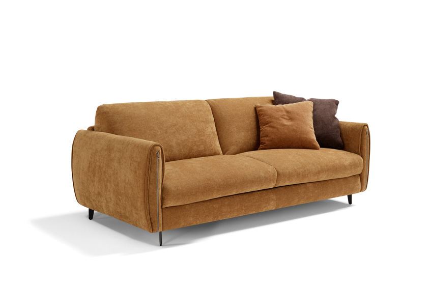 Angel sofa bed in ochre fabric, three-quarter view on white background with decorative cushions