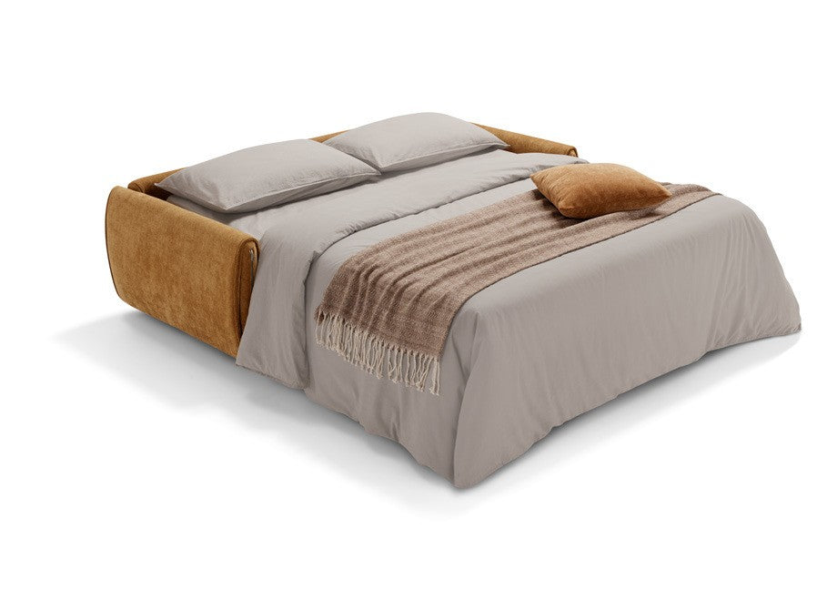 Angel sofa bed opened into a bed with mattress, pillows and bedding, ochre fabric armrests