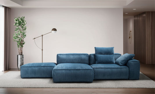 Blue corduroy-style modular sectional sofa with an open chaise end in a contemporary living room