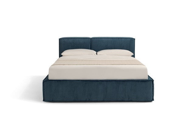 Astor bed front view in blue ribbed fabric with padded headboard, white background