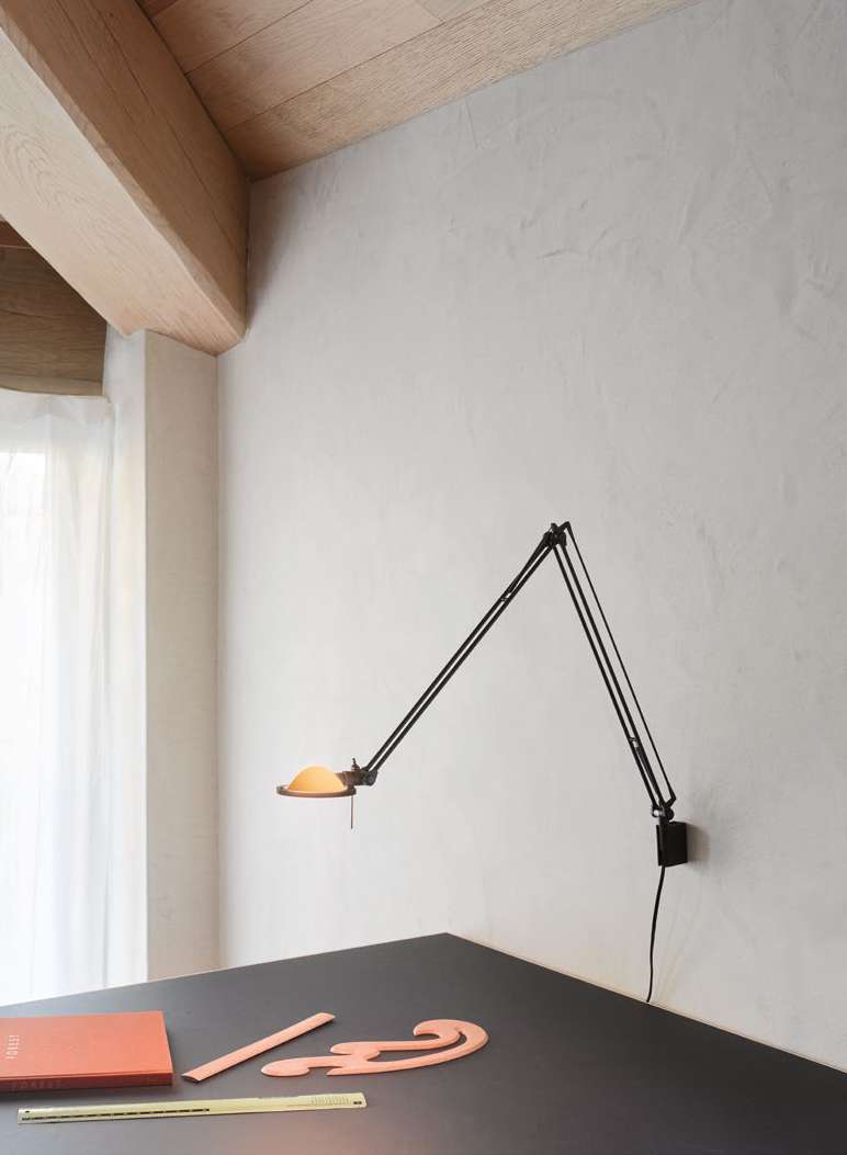 Luceplan Berenice Wall Lamp mounted above a desk