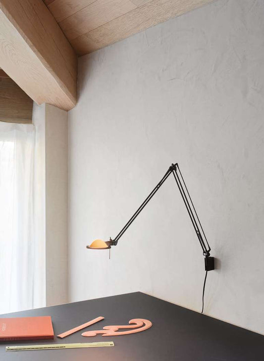 Luceplan Berenice Wall Lamp mounted above a desk