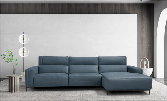 Bertè sectional sofa in blue leather with chaise longue and slim metal legs in a contemporary living room
