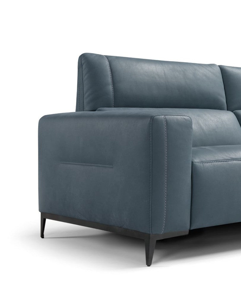 Detail of the Bertè armrest in blue leather with cross-stitching, double side stitching and metal foot