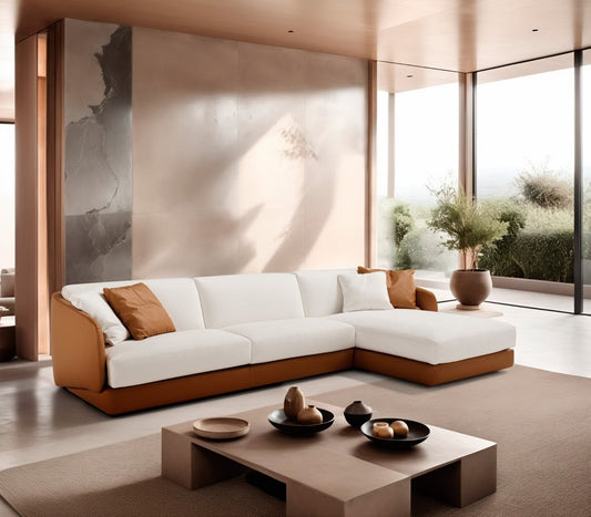Canto sectional sofa bed with chaise longue, white fabric seat cushions and cognac leather-look base in a modern living room
