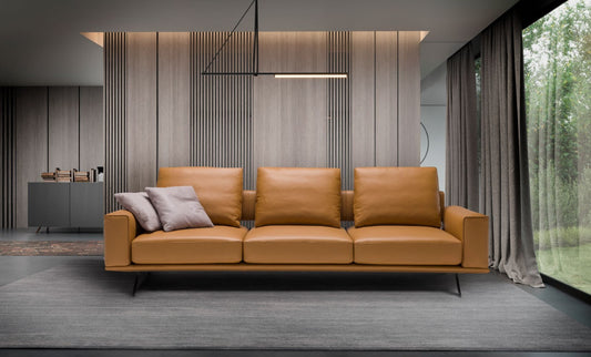 Cole sectional sofa in cognac leather styled in a modern living room, front view