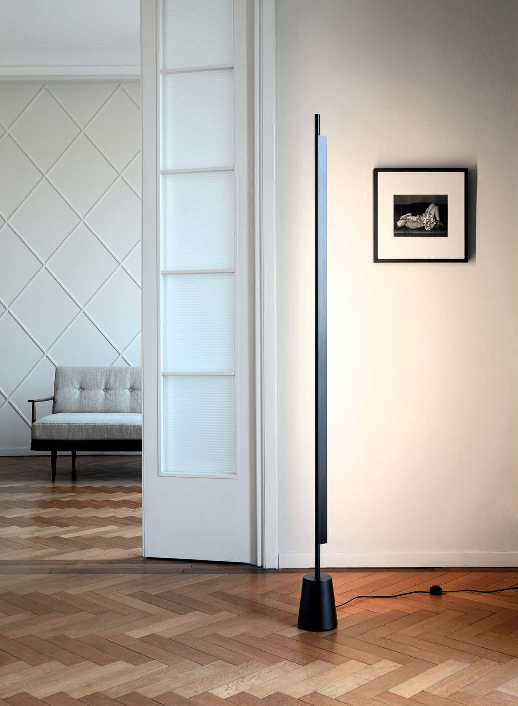 Luceplan Compendium Floor Lamp in a hallway