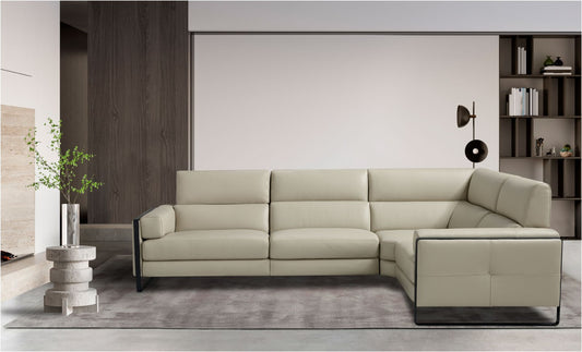 Daunia corner sectional sofa in light grey leather with black metal-framed armrests in a contemporary living room