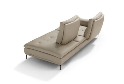 Denise one-arm sofa element in beige leather seen from behind, showing the two tilting back cushions and slim metal legs