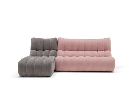 Deseo two-seater element in pink fabric with a grey chaise longue module, front view on white background