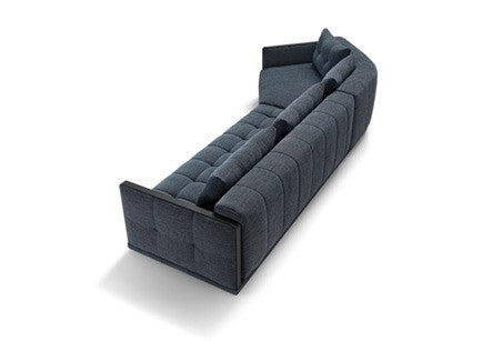 Desiderio sofa bed composition in blue fabric seen from the back, showing the slim frame and quilted seat
