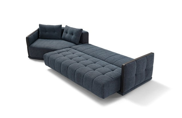 Desiderio sofa bed fully opened, showing the quilted mattress surface and angled terminal element