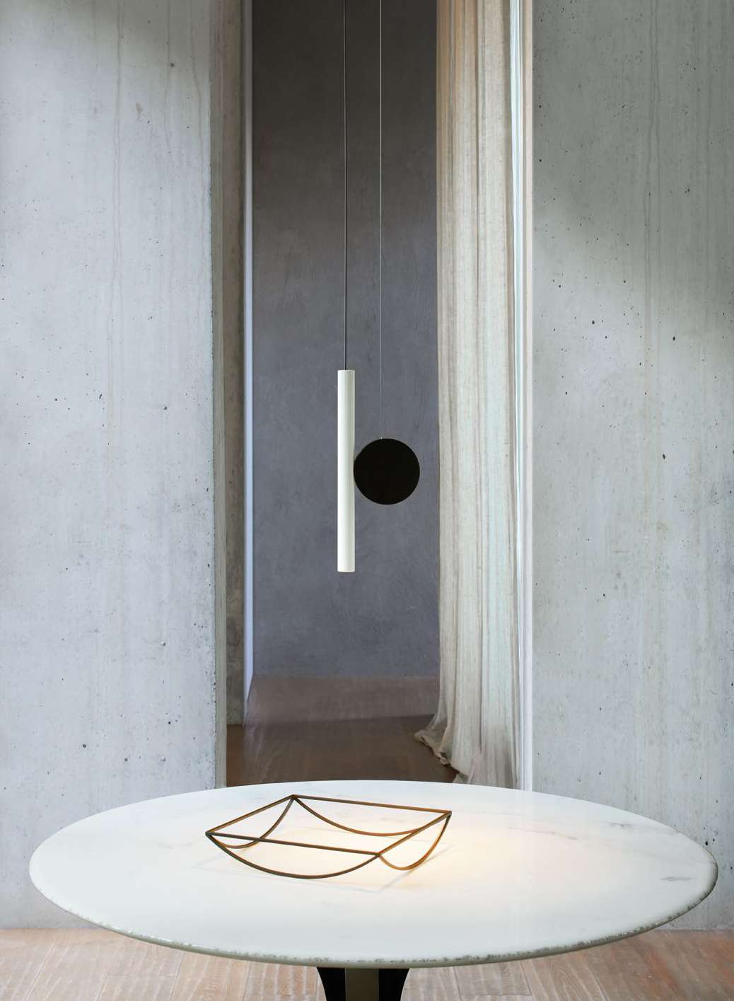 Luceplan Doi Suspension Lamp over a table
