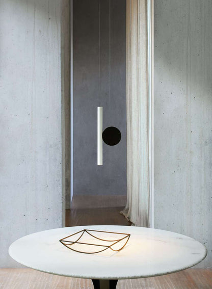 Luceplan Doi Suspension Lamp over a table