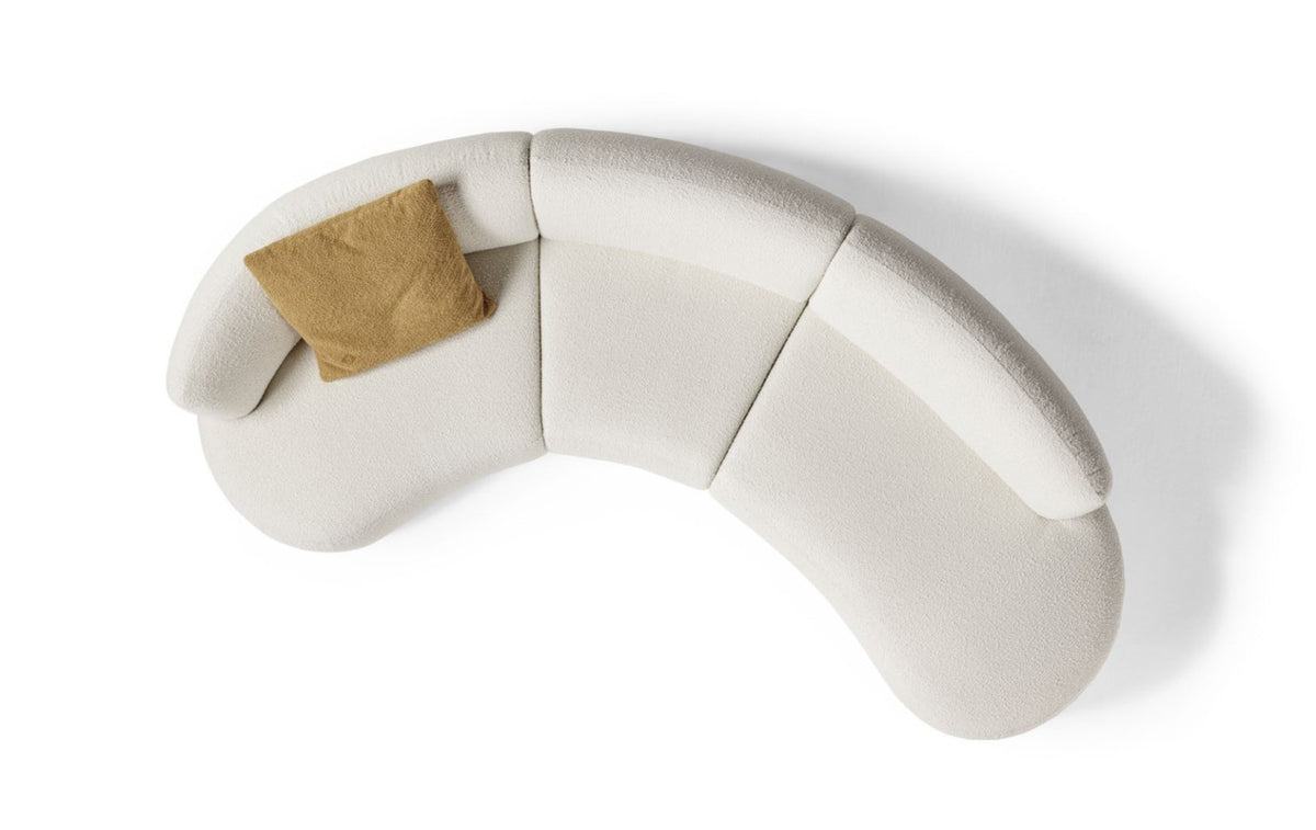 Top-down cutout view of the Elisa modular sectional sofa showing its curved silhouette