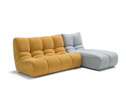 Formosa modular sofa with mustard yellow two-seater element and grey chaise longue elements on white background