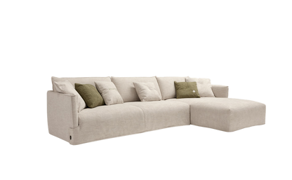 Fraser sofa bed with right chaise longue element in beige fabric, angled view