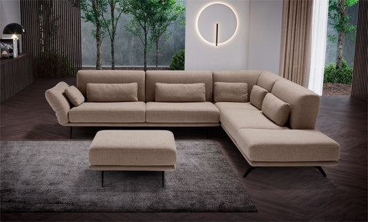 Hybrid corner sectional sofa with ottoman in a modern living room