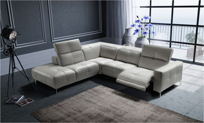 Karma sectional sofa in light grey leather with the electric reclining seat extended and adjustable headrests raised, in a contemporary living room