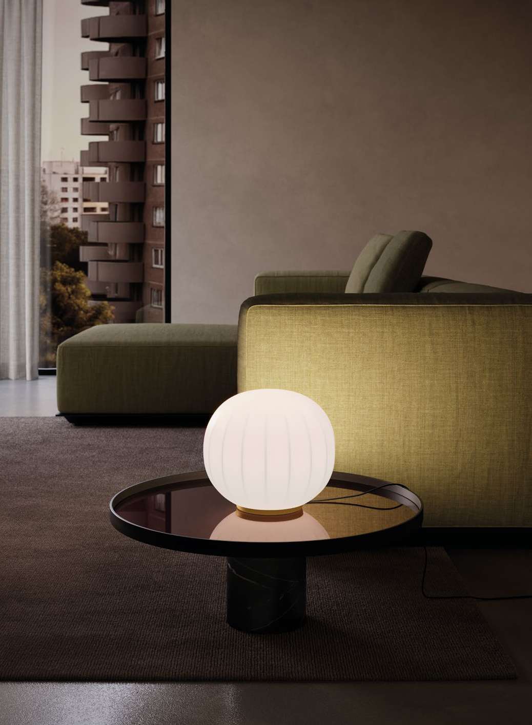 Luceplan Lita Table Lamp on a coffee table