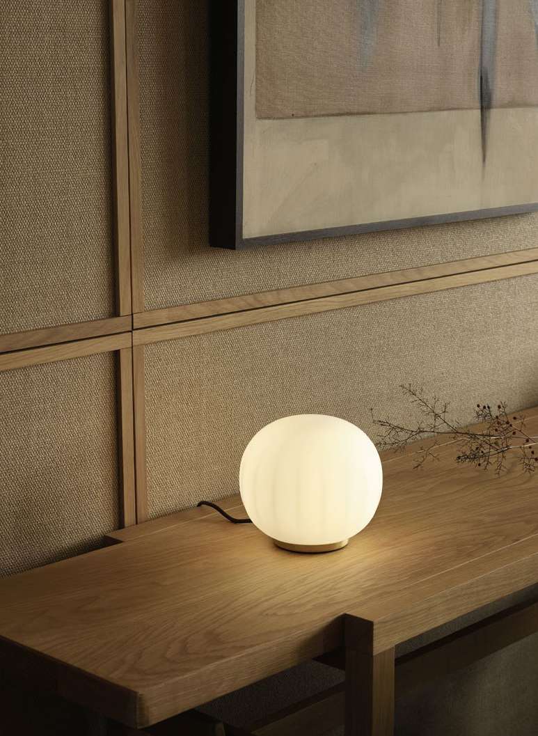 Luceplan Lita Table Lamp on a console