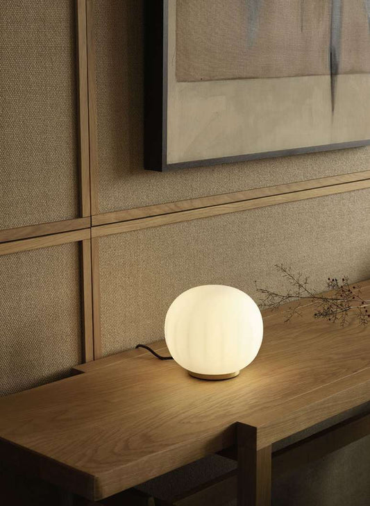 Luceplan Lita Table Lamp on a console