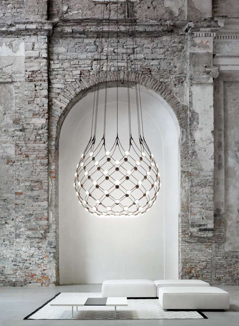 Luceplan Mesh suspension lamp, large scale, in an archway living room