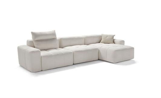 Quadra modular sectional sofa, three-quarter studio view on white background