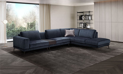 Navy blue fabric corner sectional sofa with integrated coffee table in a modern living room