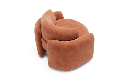 Top view of the Ringo armchair in terracotta fabric showing the circular seat cushion and wraparound arms