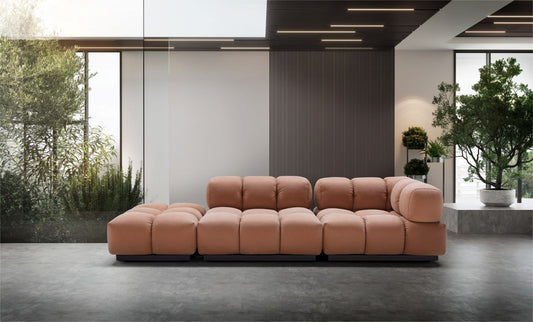 Sacai modular sectional sofa in terracotta velvet in a modern lounge setting