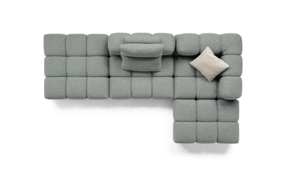 Top-down view of the Sacai modular sofa showing its checkerboard cushion layout