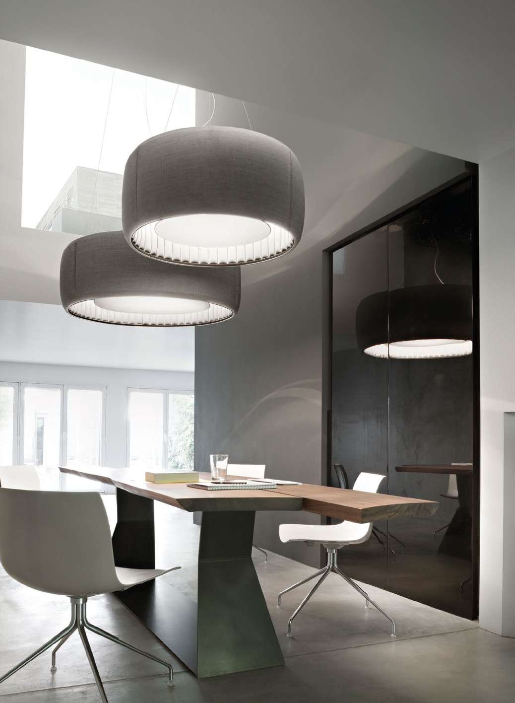 Luceplan Silenzio Suspension Lamp grey over a table