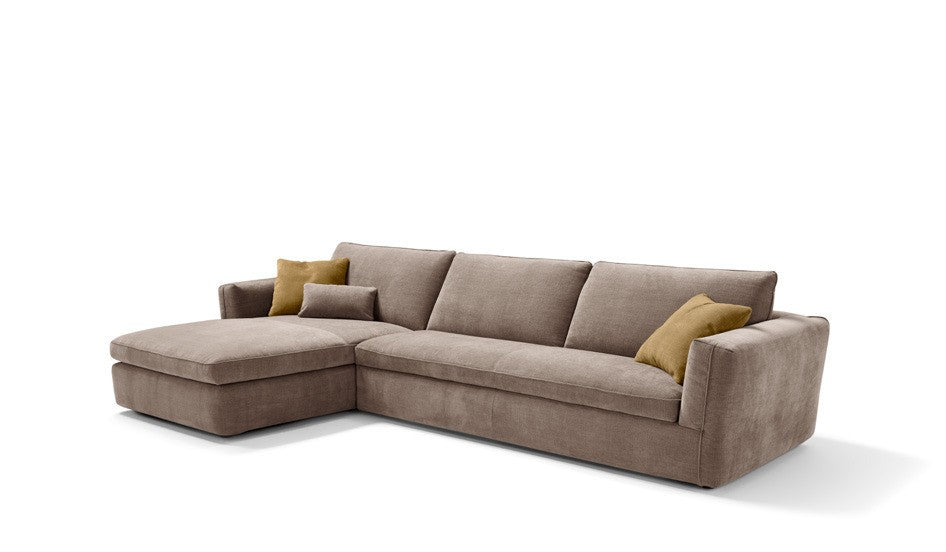 Siria sofa bed with chaise longue element in taupe fabric, three-quarter view on white background