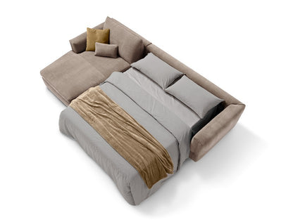 Siria sofa bed opened into a double bed with grey bedding, chaise longue element alongside, top view