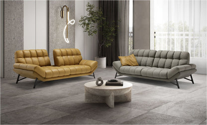 Spiga modular sofa in mustard leather with tilted backrests beside a grey fabric Spiga sofa in a bright living room