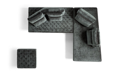 Top view of a Stor sectional composition with ottoman, showing quilted and smooth seats and freely placed back cushions