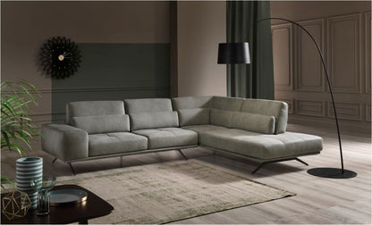 Vanoni sectional sofa in soft grey upholstery with open-end chaise longue and tilting backrests in a contemporary living room