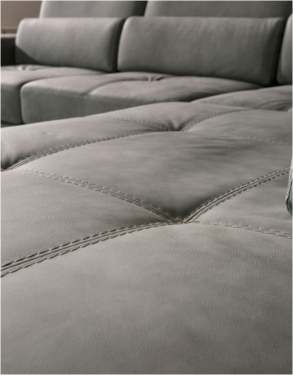Close-up of the Vanoni seat cushion with handcrafted geometric quilting and double crossed stitching